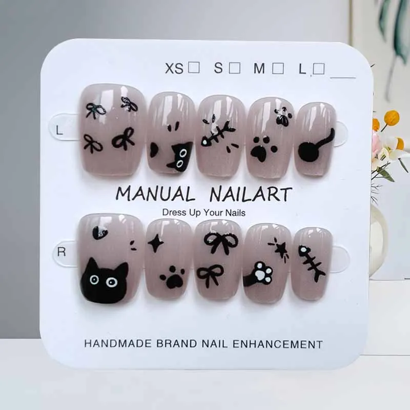 10枚入り 可愛い漫画 黒猫とピンクの蝶結び ハンドメイド つけ爪 スクエアヘッド ネイルパッチ キャットアイ ネイルスライス 付け爪 ネイルアート