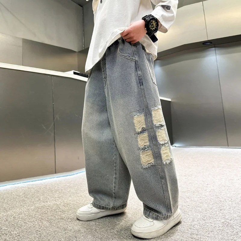 نمط جديد الأطفال فضفاض مستقيم دمرت الجينز للمراهقين الصبي عادية ممزق الدينيم السراويل الكورية الاطفال موضة بنطلون سن 4-14Y