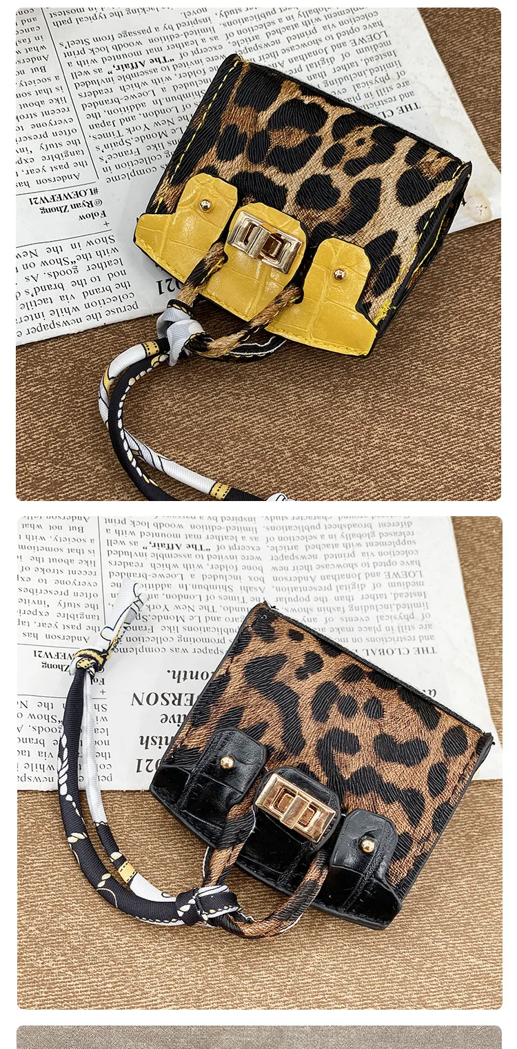 1 Stück 2026 neue Schlangenhaut-Mini-Multifunktionstasche, Joker-Münzbörse, Anhänger, Schlüsselanhänger, Bluetooth-Kopfhörertasche – Detail 11