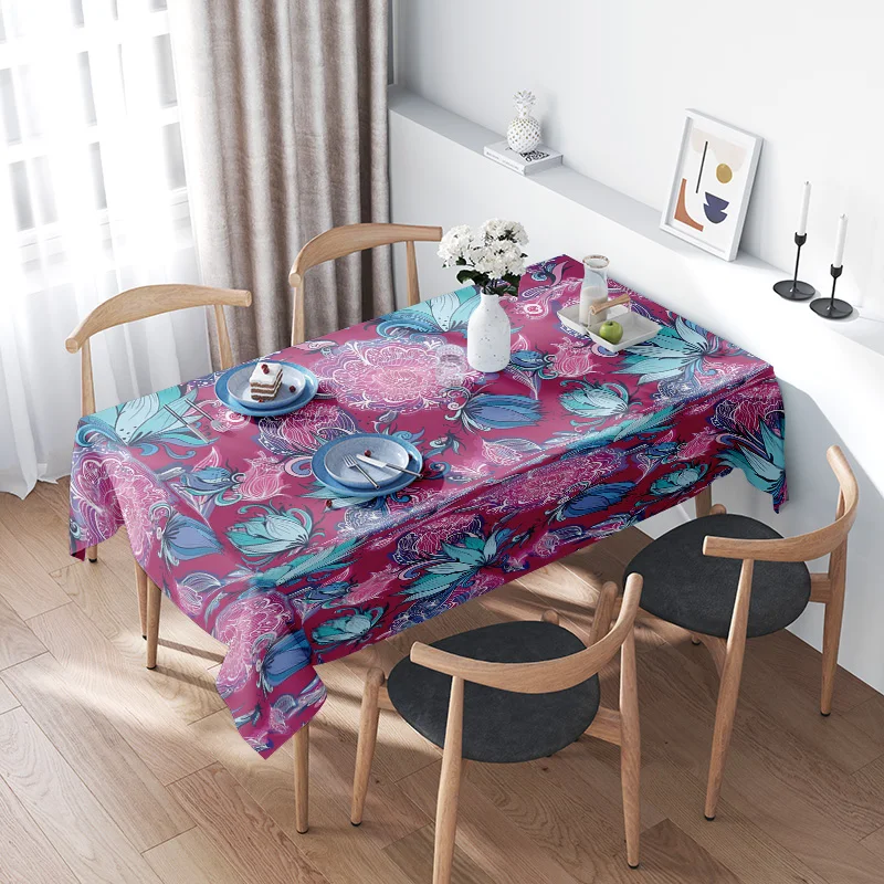 Vibrant Floral TableclothPerfect for Your Dining Room Decor This stylish tablecloth features a bold floral pattern in shades of