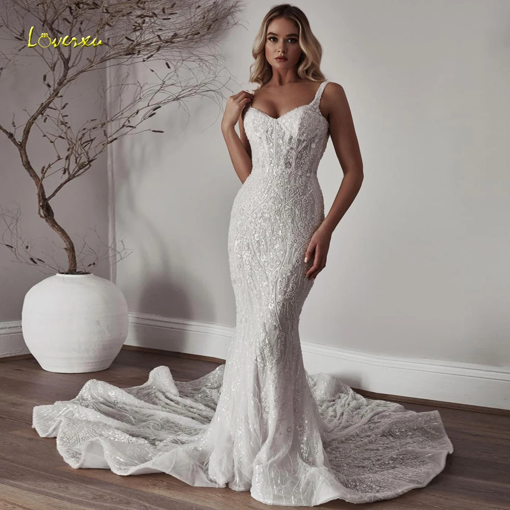 Loverxu حورية البحر فساتين زفاف مثيرة على شكل قلب بدون أكمام فيستدو دي نوفيا دانتيل مطرز لامع مصنوع حسب الطلب فستان زفاف