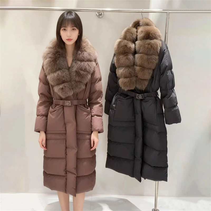 2025 Inverno delle nuove donne grande collo di pelliccia di volpe addensato caldo al ginocchio piumino d'oca moda di alta qualità piumino di media lunghezza
