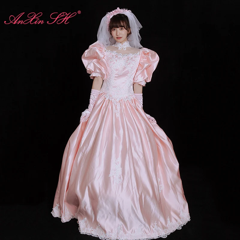 AnXin SH vintage rosa raso rosa principessa fatta a mano collo alto perline perla manica a sbuffo volant Abito da sposa antico personalizzato