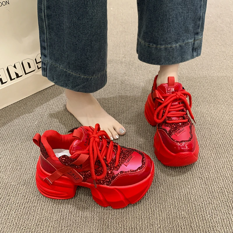 Red Winter Sneakers Detail View - Warm Fur Lining and Bling Accent Close-Up