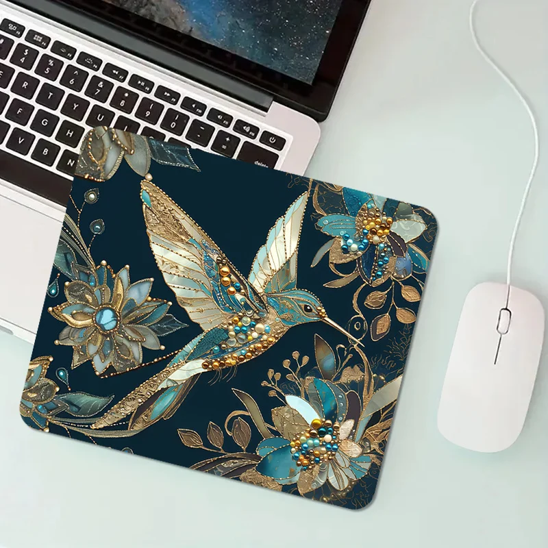 

Hummingbird and jewelry-designed square mousepad is made of anti-slip, durable rubber and washable, suitable for gamers' offices