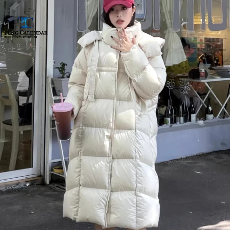 Puff ribbon duvet down jacket, medium length hooded thick Korean loose jacket, women's 2025 winter new style