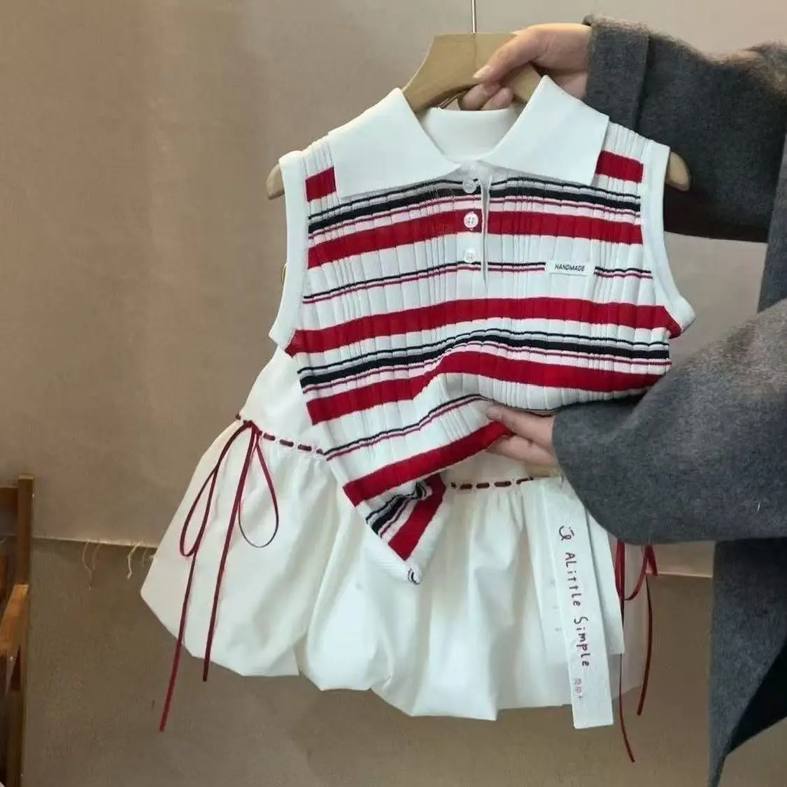 

Girls' College Summer Set 2026 New Children's Polo Collar Striped Tank Top Flower Bud Skirt Pants Two Piece Set