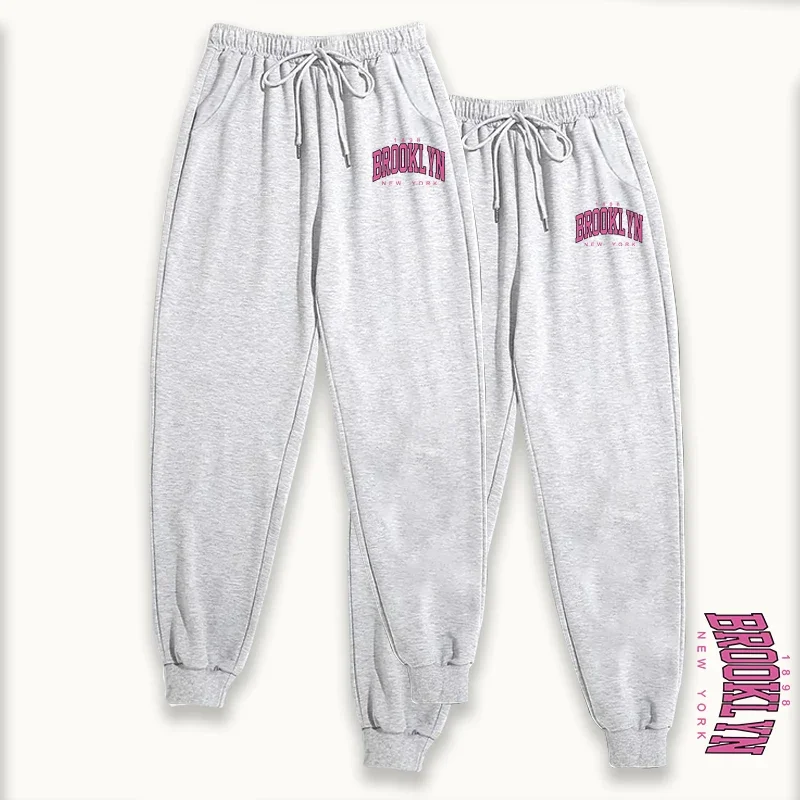 طقم نسائي مكون من قطعتين بنطال رياضي عصري بنطال صالة ناعم 2025 خريف شتاء مريح غير رسمي نمط الشارع قيعان