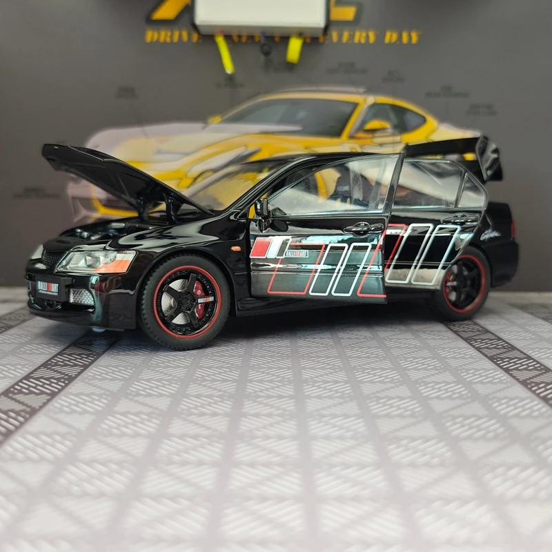 Modelo de aleación de coche de rally Mitsubishi EVO de 9ª generación a escala 1:24, puertas y capó del motor se pueden abrir.