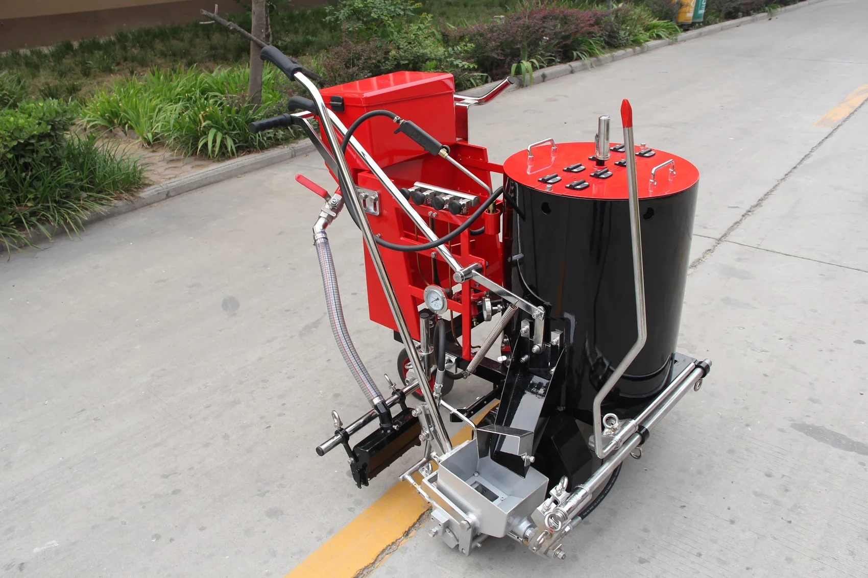 Multifunctionele handduwtype thermoplastische verf Way Line wegmarkeermachine