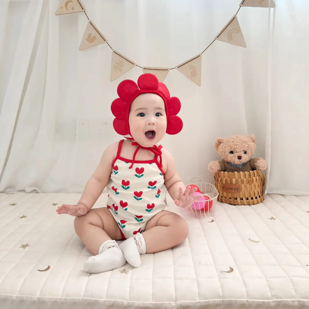 

Baby One Piece Clothes 2025 Summer Korean Baby Bodysuit Ins Flower Full Printed Baby Sling Climbing Clothes With Hat