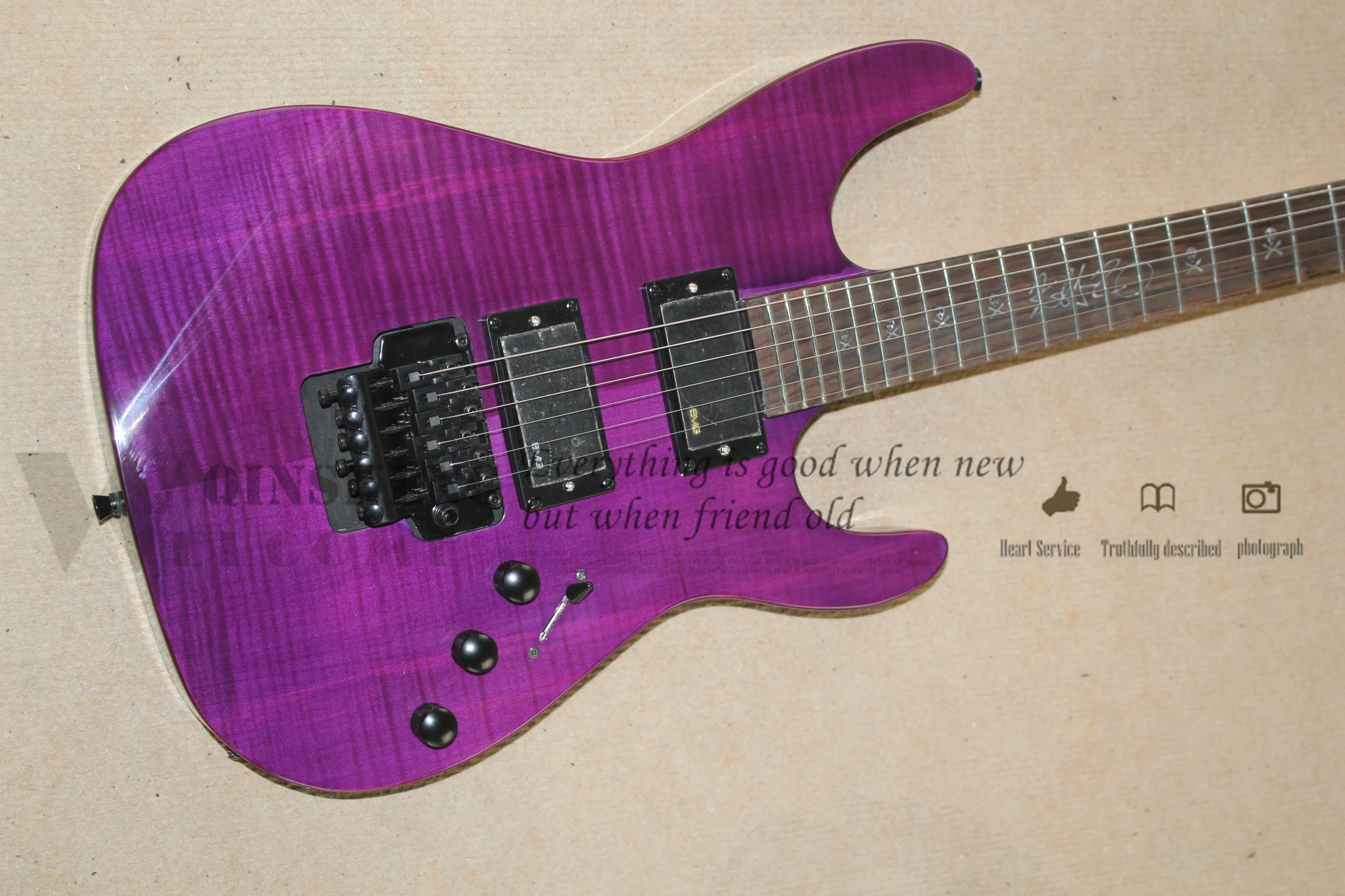 Classic electric guitar, purple guitar flamed maple veneer, vibrato bridge, rosewood fingerboard skull inlay, black button