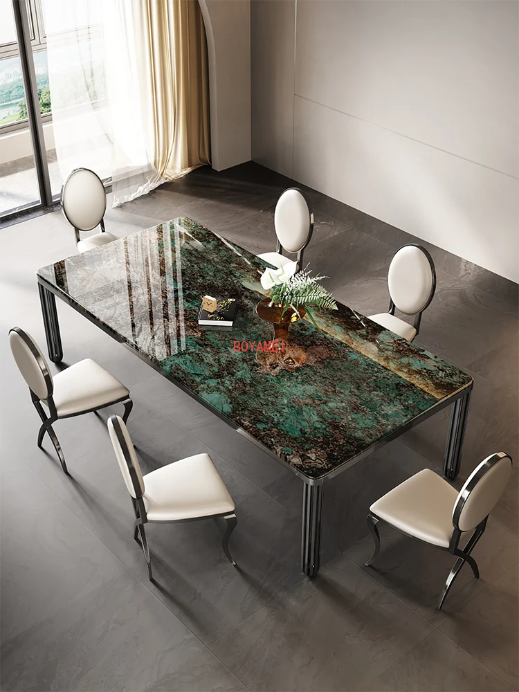 green marble dining tables and chairs in the villa is simple, light luxury dining table with small family size is new in 2022.