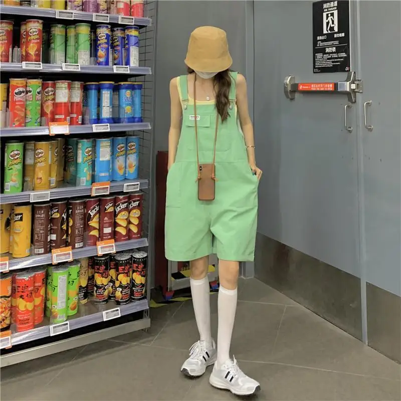 Damskie kombinezony, eleganckie czarne kombinezony, codzienne kombinezony jeansowe, czerwone zimowe bezrękawniki, szykowne niebieskie długie kombinezony imprezowe, duże rozmiary.