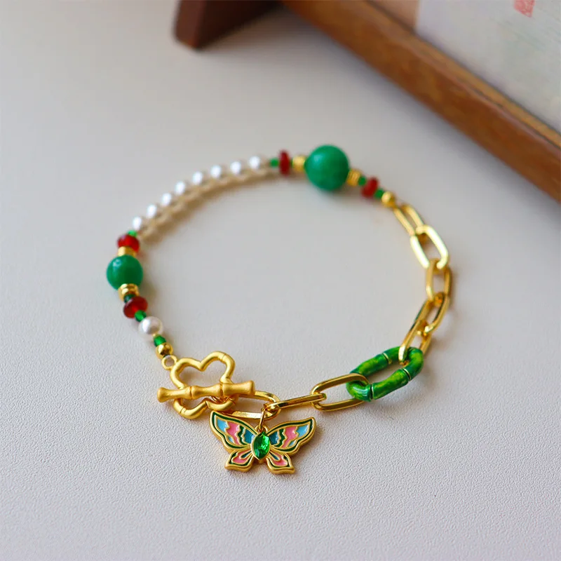 

Fashion light luxury four-leaf clover butterfly pearl bracelet senior sense personality temperament retro jewelry