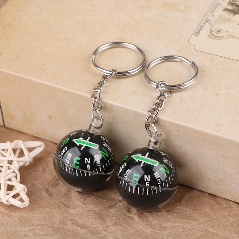 

1pcs Creative Mini Compass Keyring Backpack Pendant Portable Emergency Compass Outdoor Camping Survival Ball Compbum Keychain