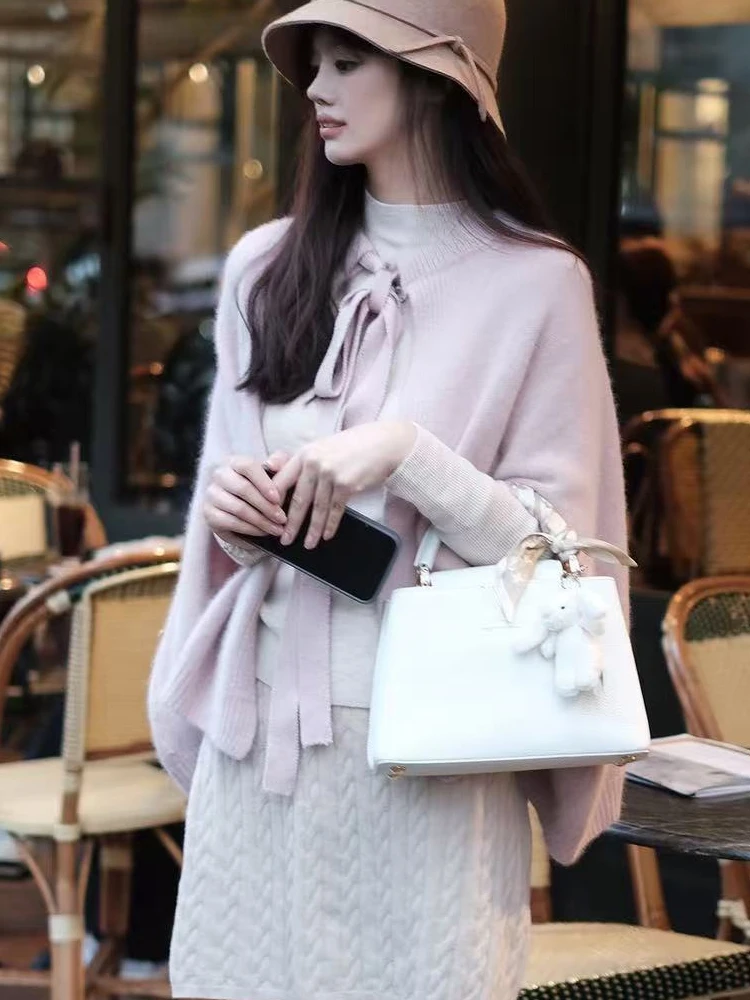 Scialle maglione coreano elegante tinta unita da donna dolce fiocco legato cardigan lavorato a maglia senza maniche moda maglieria esterna allentata