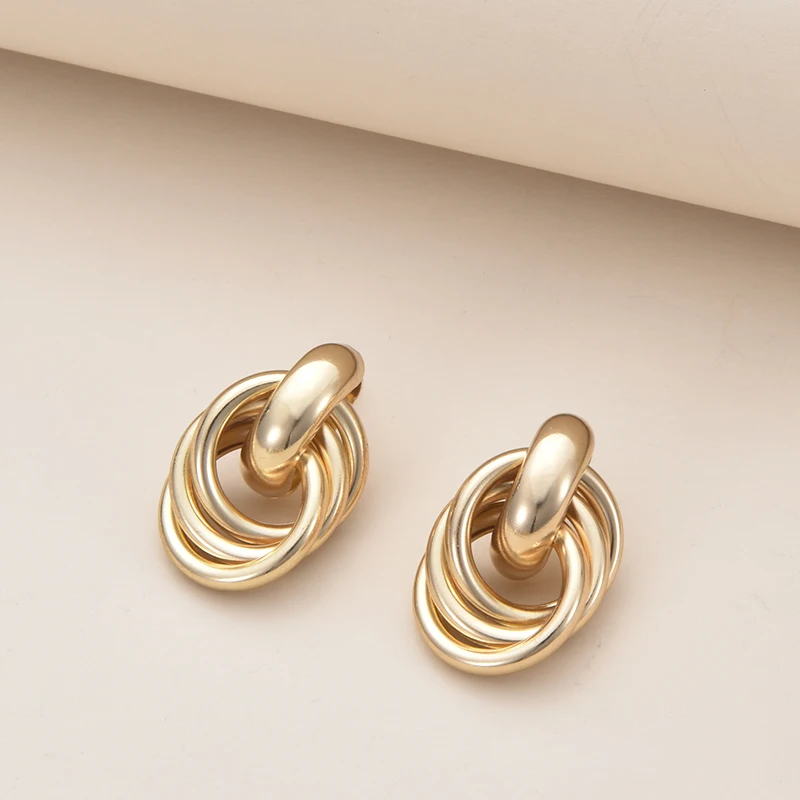 Fashion Twist Knot Metal Stud Earrings For Women Hollow Geometric Gold Silver Color boucles d\'oreilles Unusual Earrings Jewelry