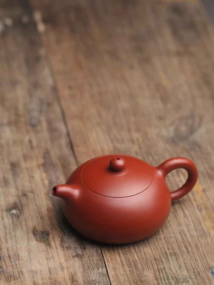 

xing Purple Clay Zhu Nu Clay Gongfu Tea Pot Small Epilobium Tea Set Pouring Kettle Handle Kettle Home Gift