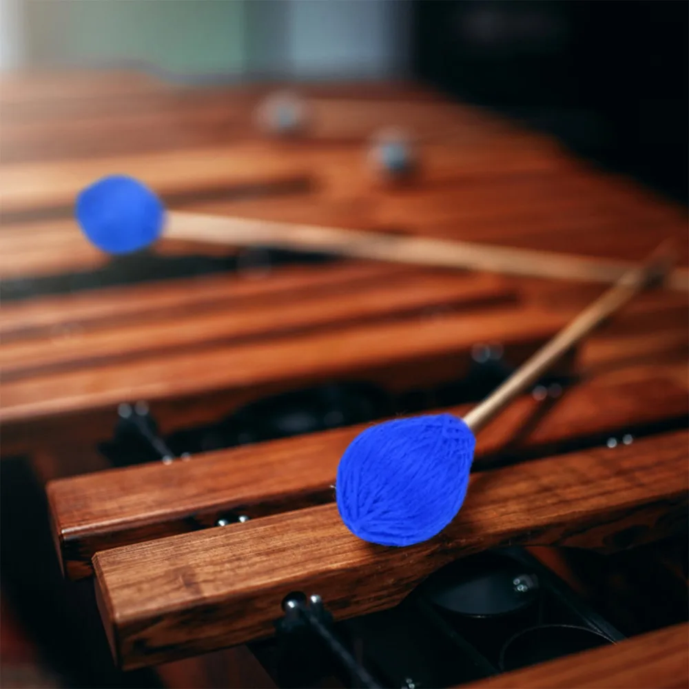 ​ ​ Manijas de Fibra de Vidrio ​   Baquetas de marimba con cabeza de hilo ​ ​ Ligero ​ Azul ​ Baquetas para Vibrafono ​ ​ 14.2 * 1.4 pulgadas ​ Baquetas de Percusión ​