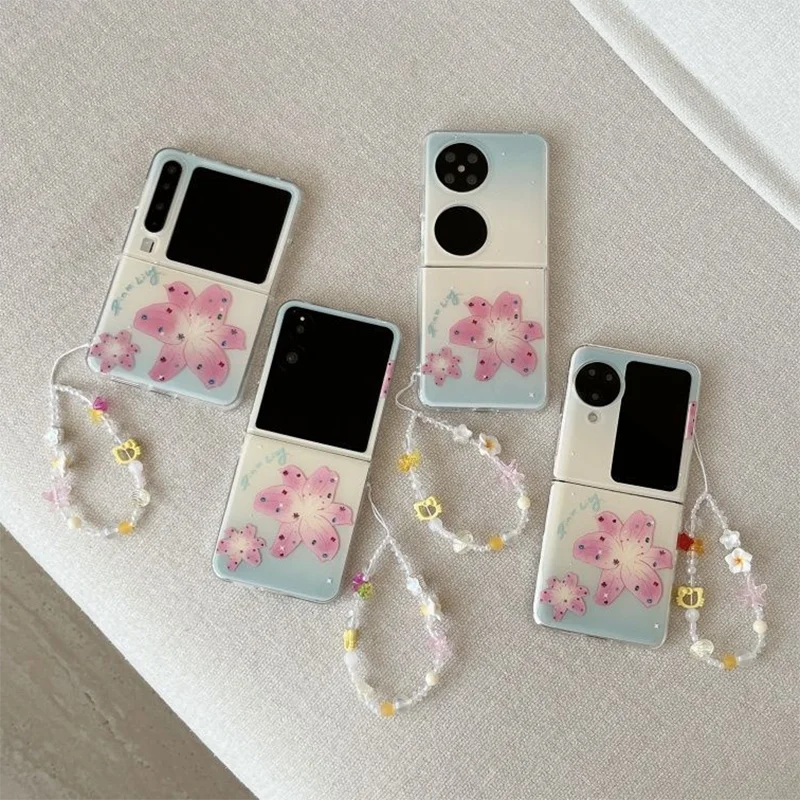 

zflip7 Case Cute Gradient Pink Lily Flower Case For Samsung Z Flip 7/6/5 /Mixflip Floral Case With Beaded Wrist Strap