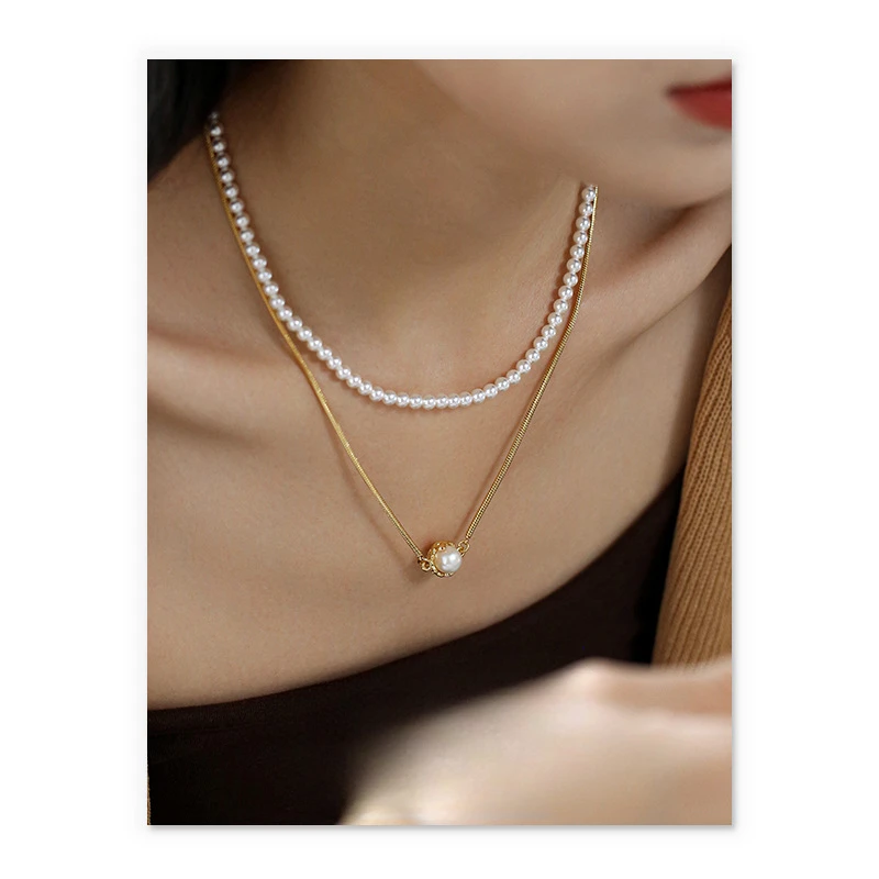 

European and American minimalist niche snake bone chain natural pearl pendant cold wind titanium steel necklace women