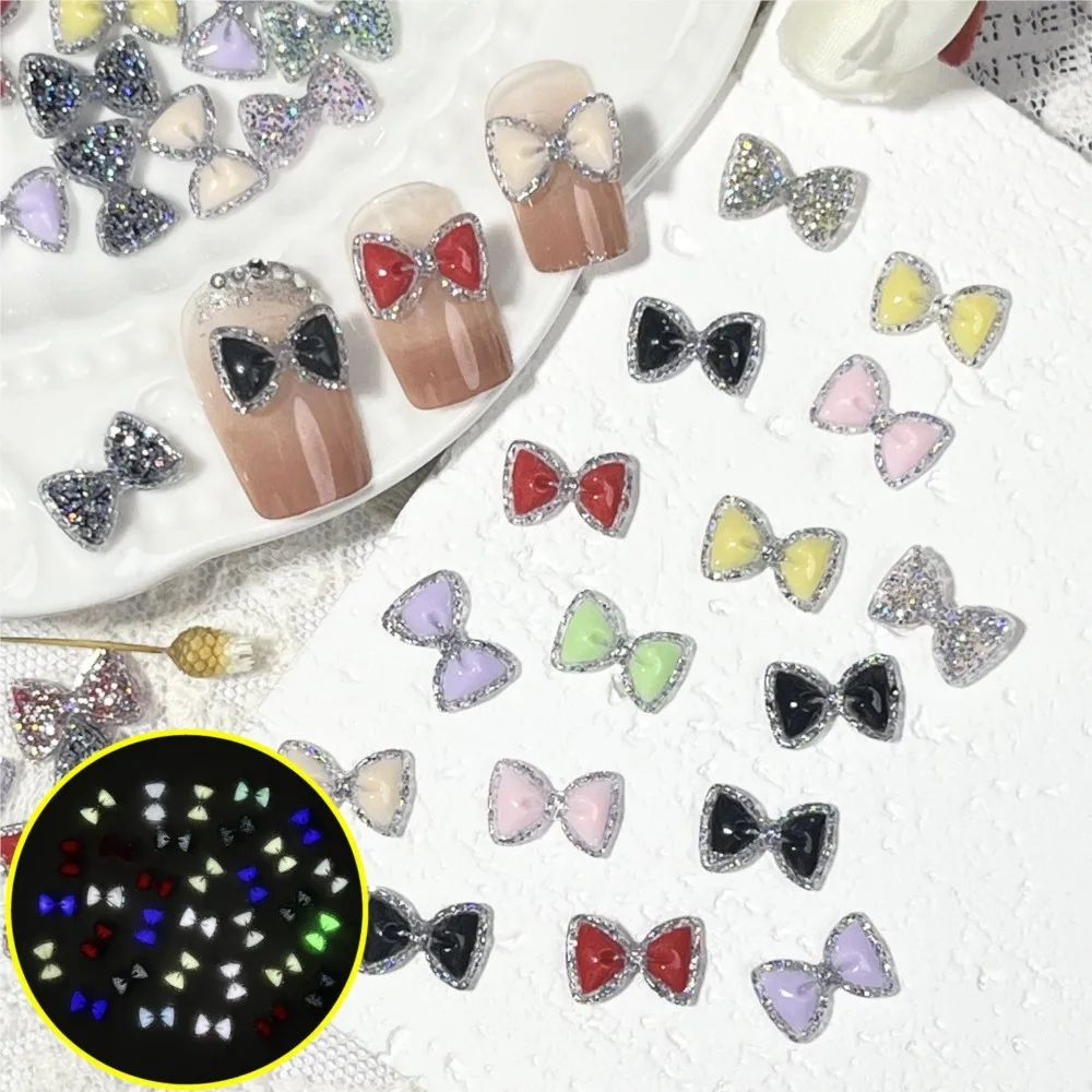100 Uds pajarita luminosa dijes para decoración de uñas lazo de resina brillante accesorios para decoración de uñas pajarita de lujo para artesanía de manicura funda de teléfono