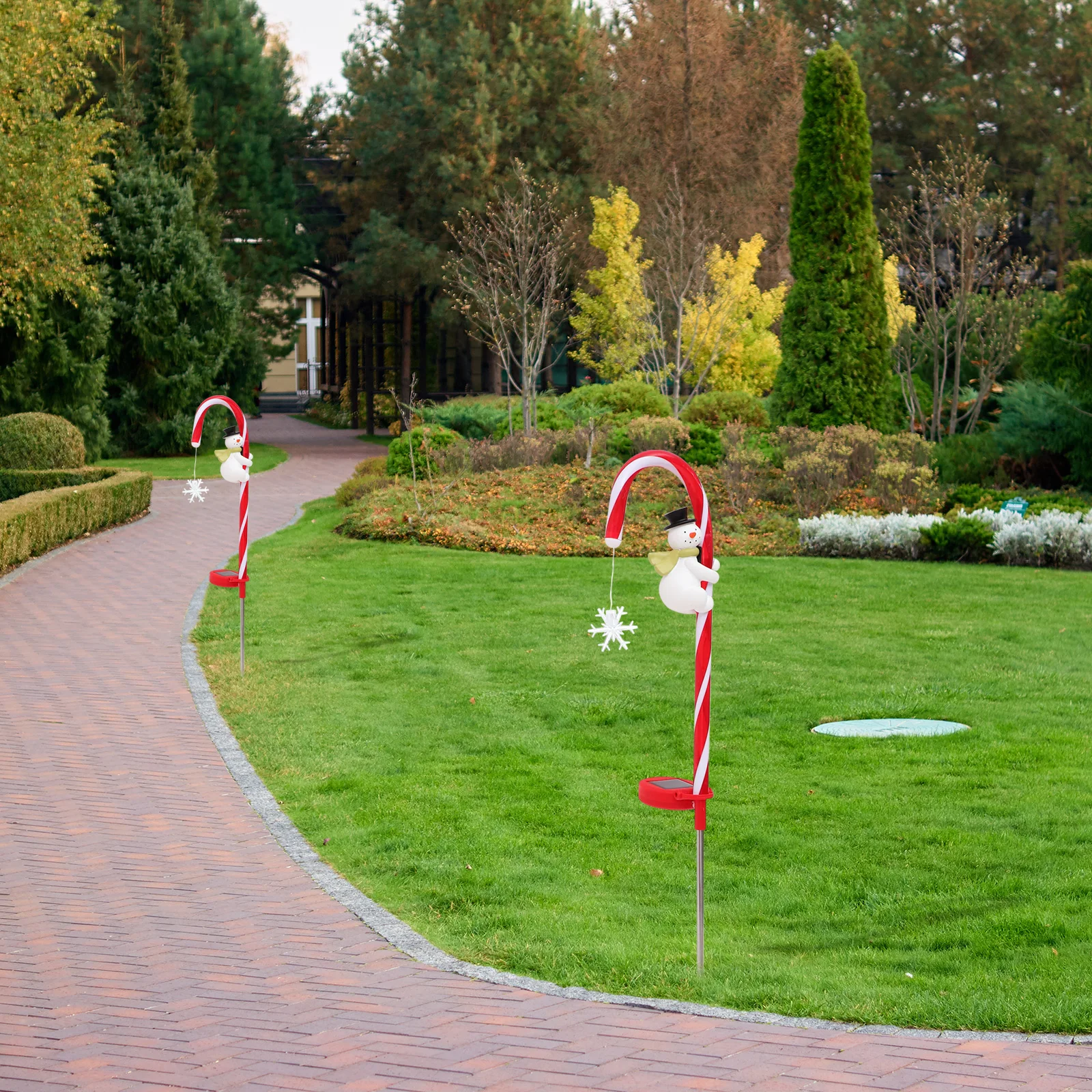 Lámpara Solar de jardín con forma de muñeco de nieve de bastón de caramelo, luz pequeña de estaca para césped al aire libre, luz decorativa para camino de patio con energía Solar