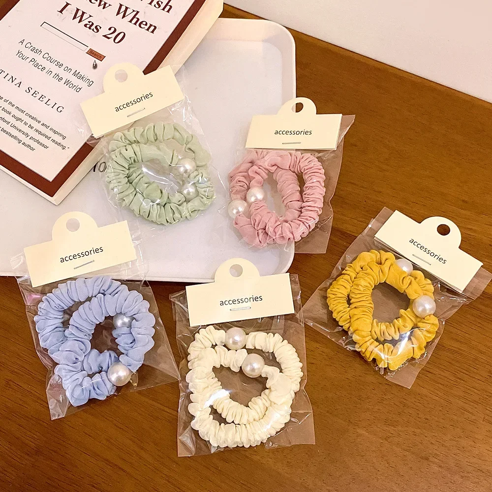 

Korea Candy-colored Pearl small intestine hair band sweet and lovely ball hair rope headdress girl Mori rope hair accessories