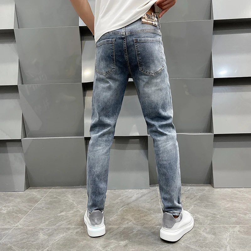 Light luxury all-matching jeans men's street fashion simple casual elastic trend Korean high-end slim fit tapered pants