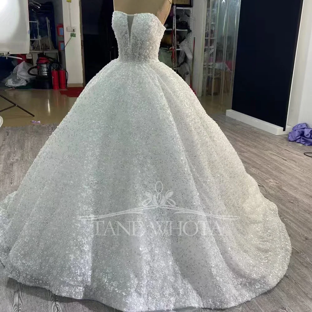 فستان زفاف أنيق مثير بدون حمالات بدون أكمام مطرز بالترتر برباط خلفي غمد فستان زفاف عصري قابل للتخصيص