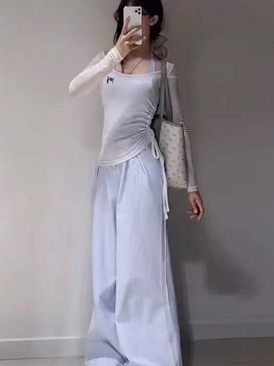 Conjunto de peças de camiseta sensual irmã coreano puro desejo cintura costurado transparente pendurado ne colete emagrecimento calças azuis