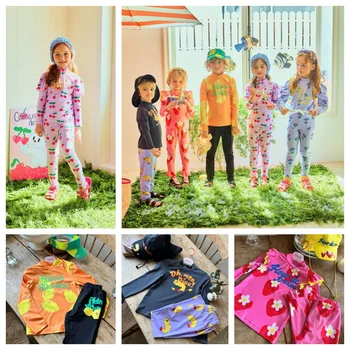 Children's suit 2024 summer boys girls new long sleeve children's cartoon printed 2pcs swimsuit Korean baby swimwear set