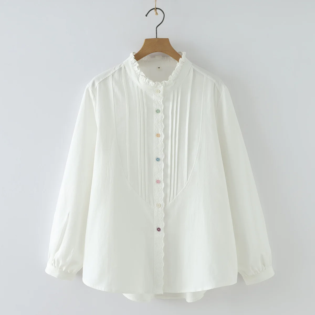 เสื้อเชิ้ตแขนยาวผ้าฝ้ายฤดูใบไม้ร่วงปี 2025 รุ่นใหม่ แต่งระบายแบบต่อผ้าสำหรับผู้หญิง สไตล์ Mori Girl ดีไซน์พับเก็บได้ สวยเก๋ ทันสมัย ทรงหลวม รุ่น T59125CC