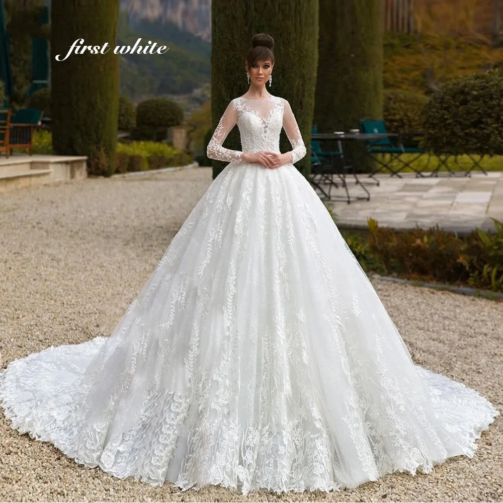 فساتين زفاف مخصصة بأكمام طويلة ورقبة دائرية مزينة بأربطة فستان زفاف الأميرة فيستدو دي نويفا