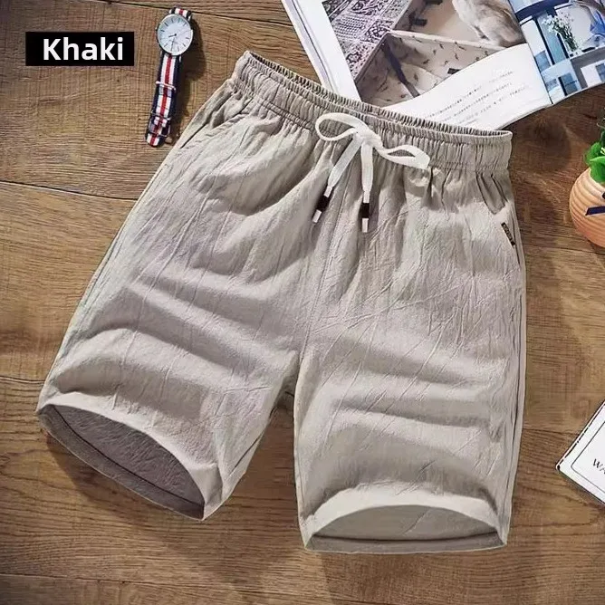 Pantaloni medi da spiaggia a cinque quarti larghi in lino di cotone sottile traspirante in vita elastica casual da uomo nuovi estivi