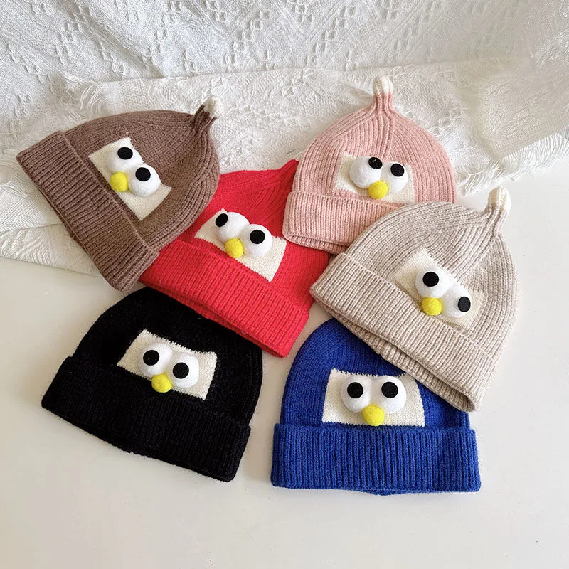 

Baby hat autumn and winter men's and women's baby knitted warm woolen hat cute super cute eyes children's head hat