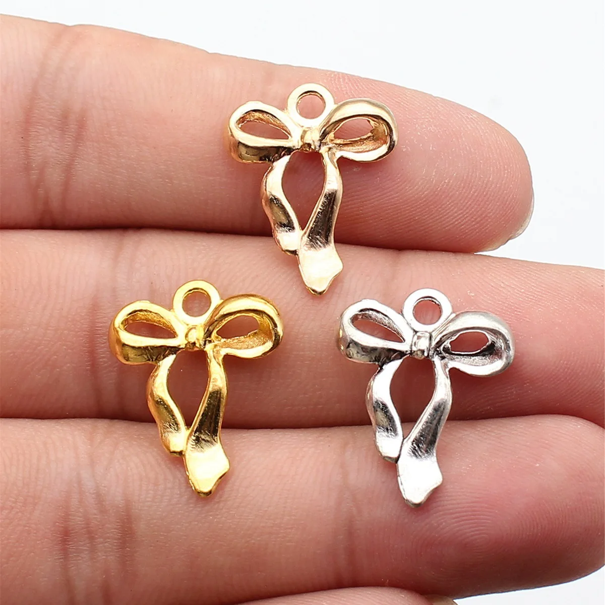 WYSIWYG 10 sztuk/partia Bow Charms do tworzenia biżuterii 17x22mm akcesoria antyczne kolor srebrny
