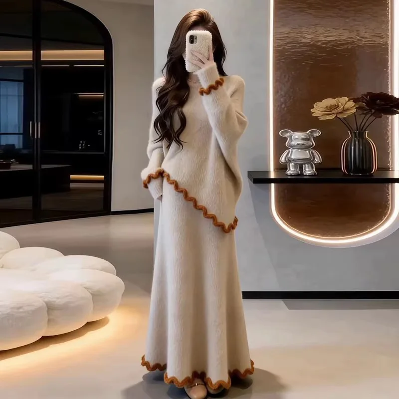 

Новые женские вязаные костюмы в нежном стиле: модные комплекты с асимметричным свободным свитером с круглым вырезом и длинными рукавами для весны и осени