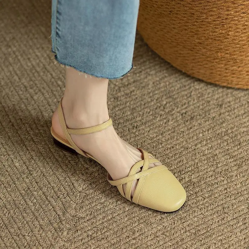 Baotou Women's Sandals  New Summer Retro Hollow Thick Heel Button Soft Leather Roman Sandals Flat Bottom