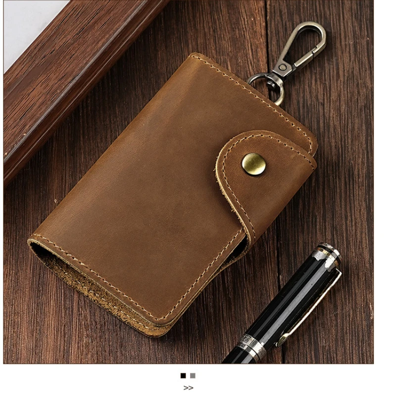 Estuche de llaves de piel vintage unisex para cinturón con ranuras para tarjetas, porta llaves multifunción para guardar llaves de coche, monedas y tarjetas bancarias.