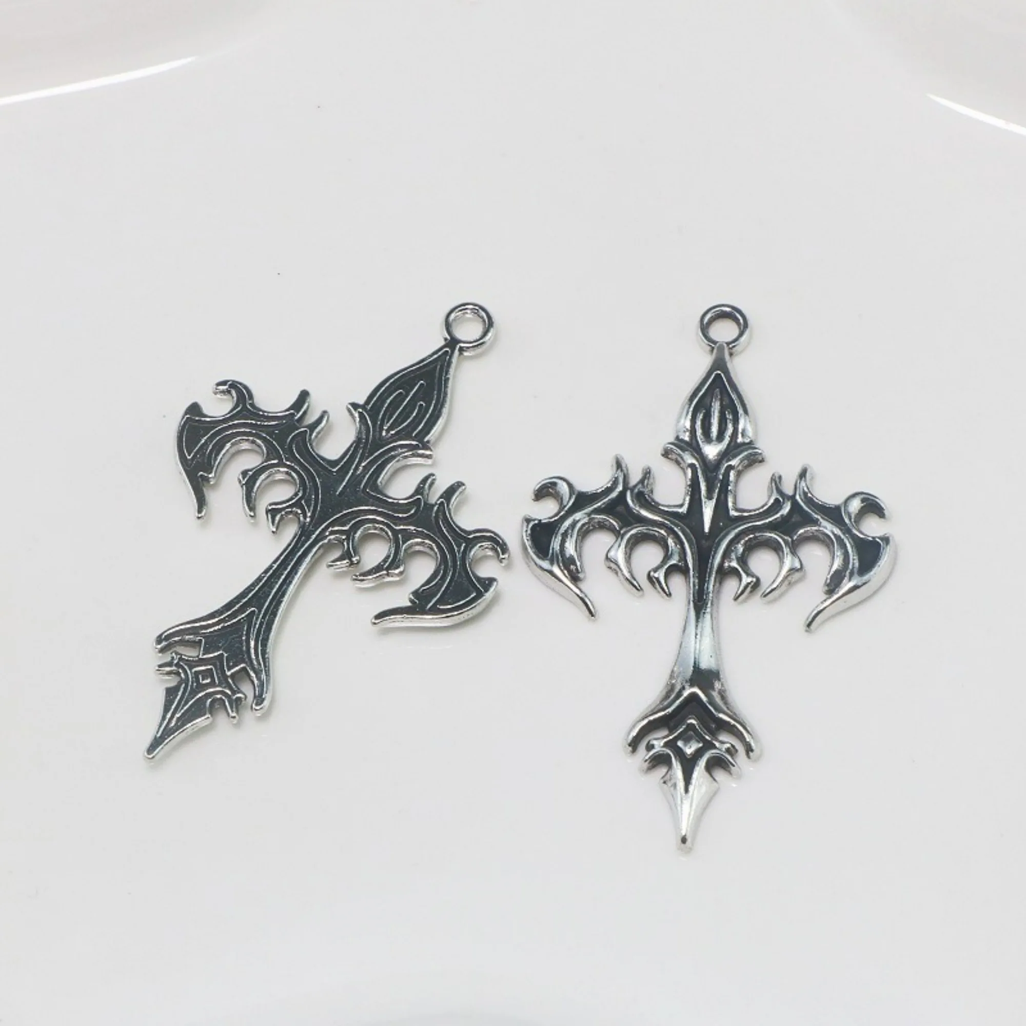 20 pièces d'accessoires en alliage de zinc, style croix-papillon, pour la création de boucles d'oreilles, pendentifs, bracelets et colliers