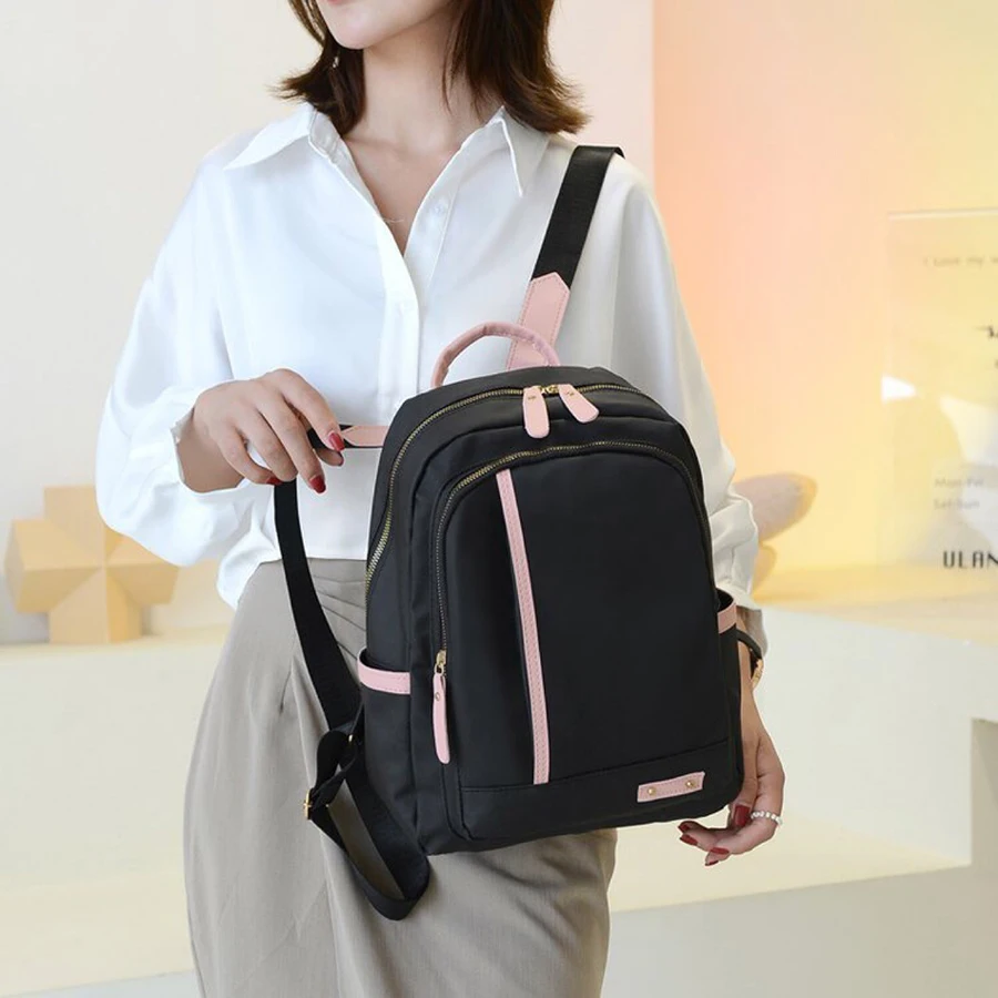 

Oxford Cloth Backpack for Women: Large Capacity, Versatile Design, College-Style, Waterproof, Lightweight Travel Bag