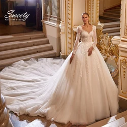 Affascinante abito da sposa in organza con ricamo in pizzo con perline abito da ballo treno o-collo manica lunga bottone Vestido De Novia personalizzato