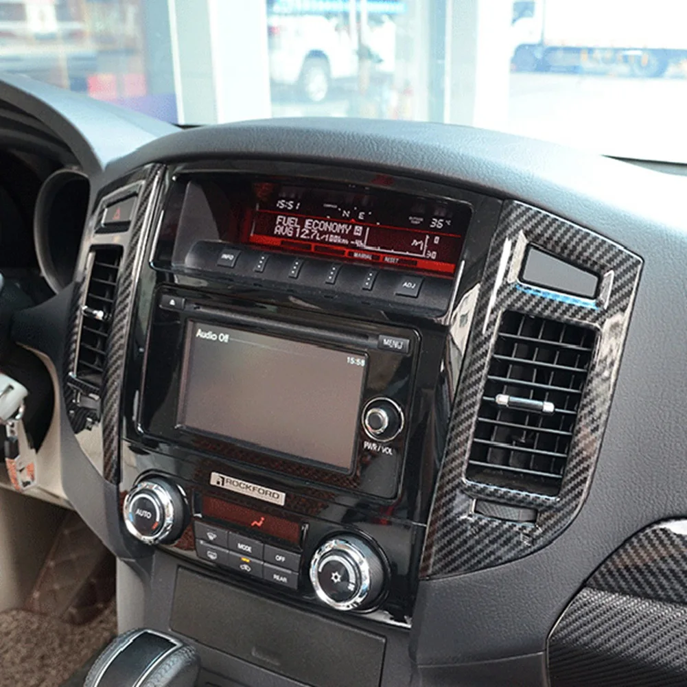 คอนโซลกลางช่องแอร์แผงหน้าปัดภายในทำจากคาร์บอนไฟเบอร์ตกแต่งปลอกคอกันสุนัขเลียช่องปล่อยระบบ a/c สำหรับ Mitsubishi Pajero 2007-2019