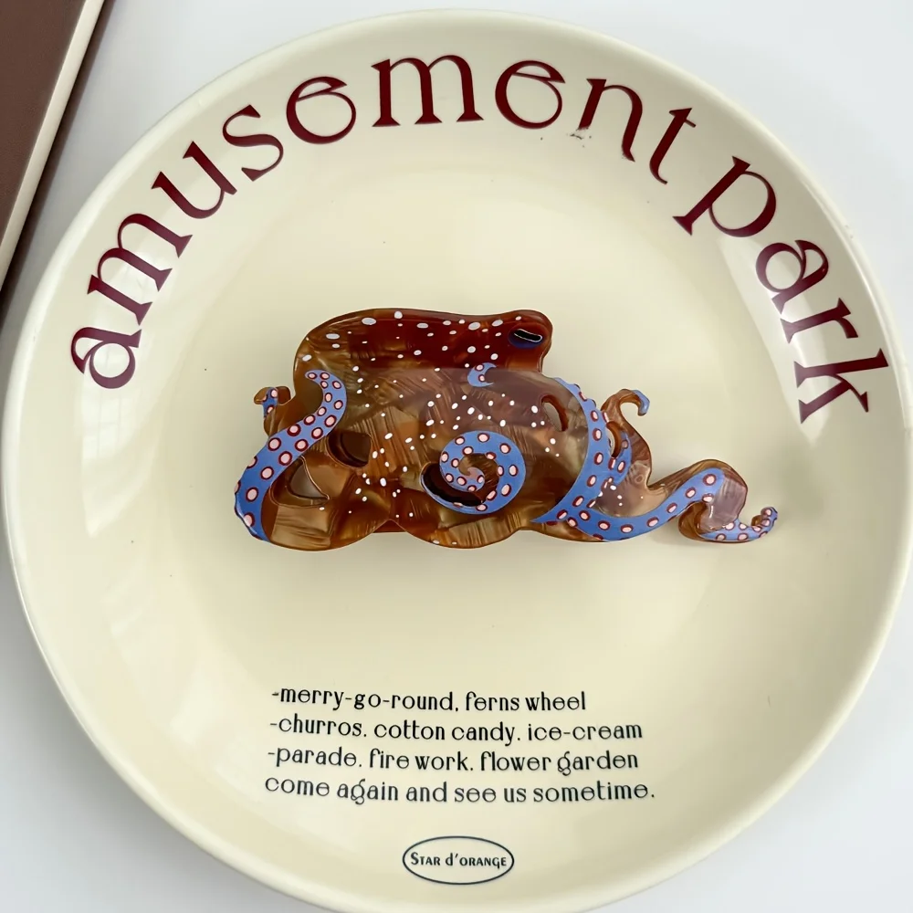 مخلب المحيط الأخطبوط: نمط ترفيهي فريد من نوعه، مصنوع يدويًا من مادة الأسيتات عالية الجودة، مما يجسم الموضة والاتجاه.