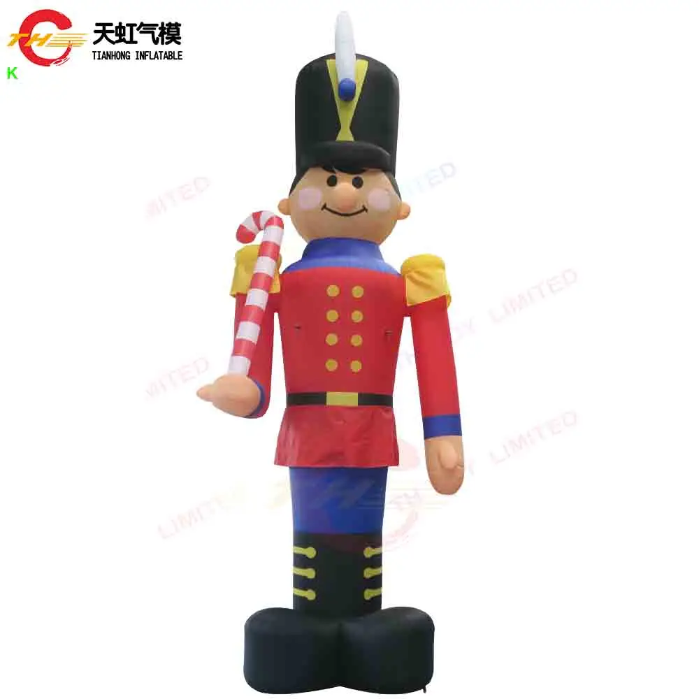Transporte aéreo rápido soldado inflável dos desenhos animados tema do reino unido modelo de decoração inflável de natal com ventilador