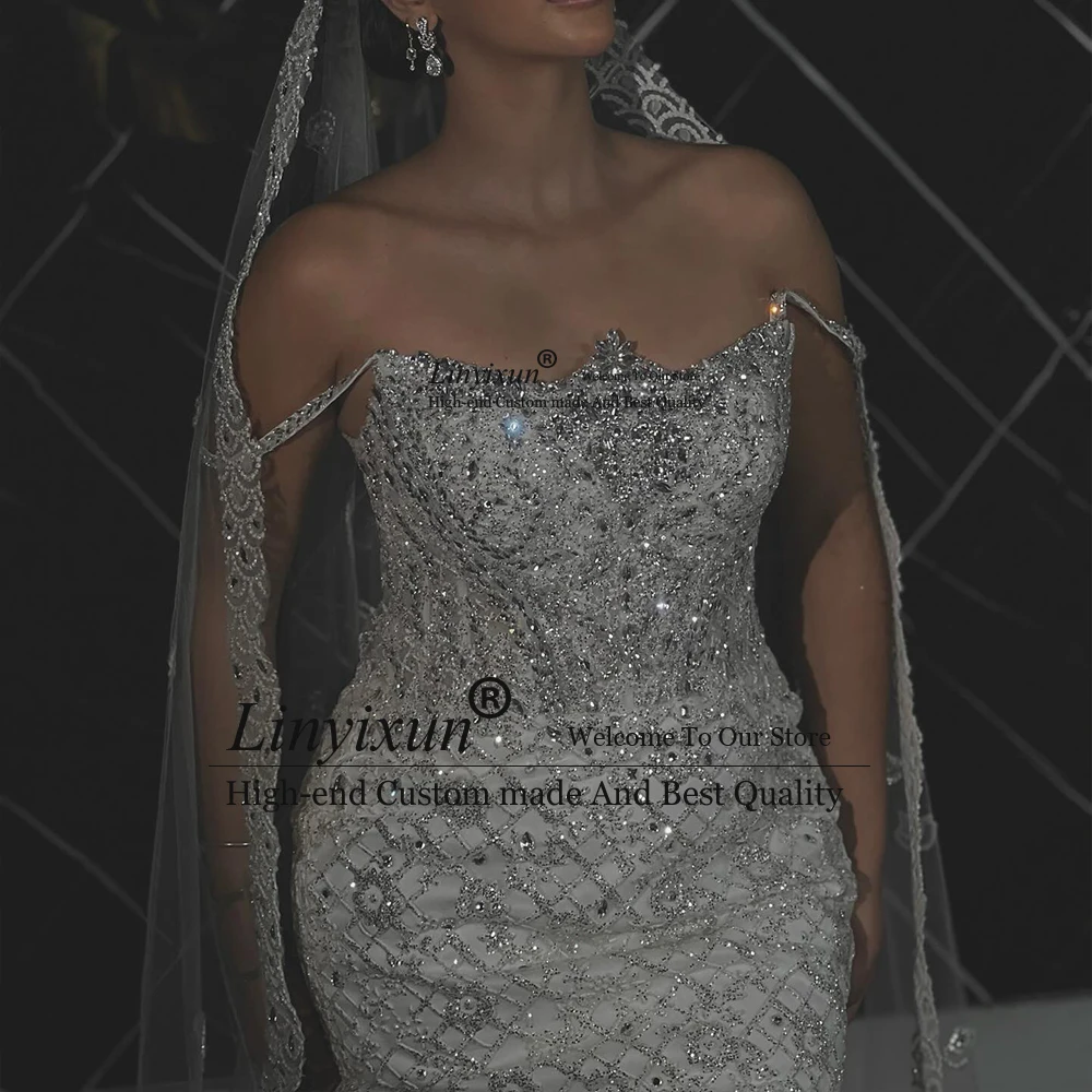 분리 가능한 기차가있는 럭셔리 스팽글 웨딩 드레스 민소매 인어 신부 가운 맞춤형 فساتين زفاف ٢٠٢٥ W