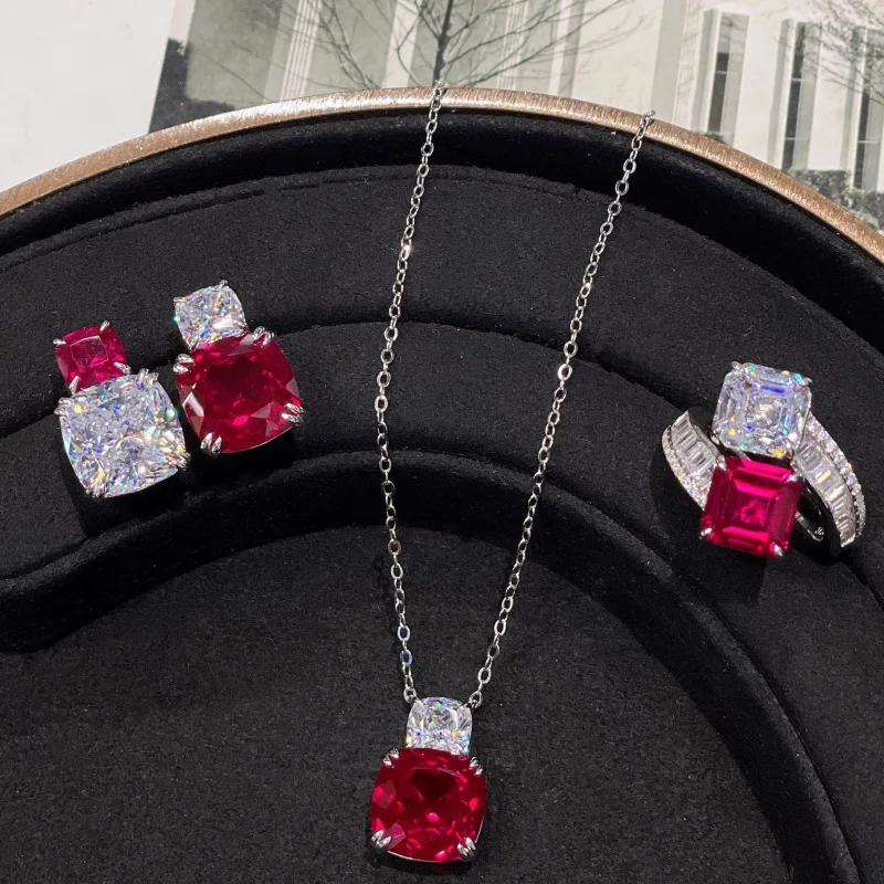 

Luxurious red corundum pendant necklace for women - A set of cultivated synthetic ruby jewelry for a fashionable evening event