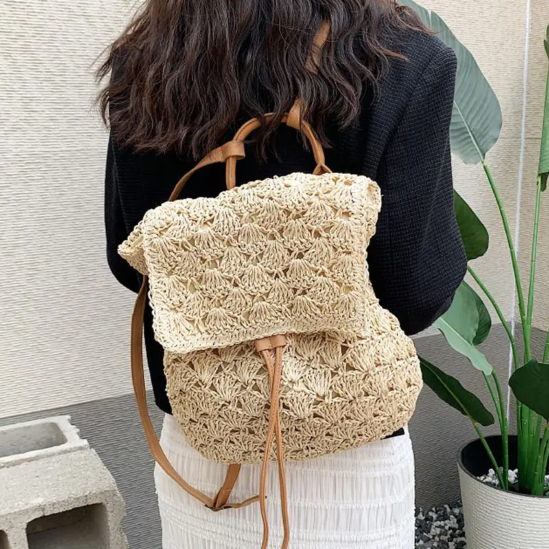 Mochila de paja para mujer, bolsa de viaje de mimbre tejida informal, estilo de vacaciones en la playa, mochila Coreana de punto con cordón